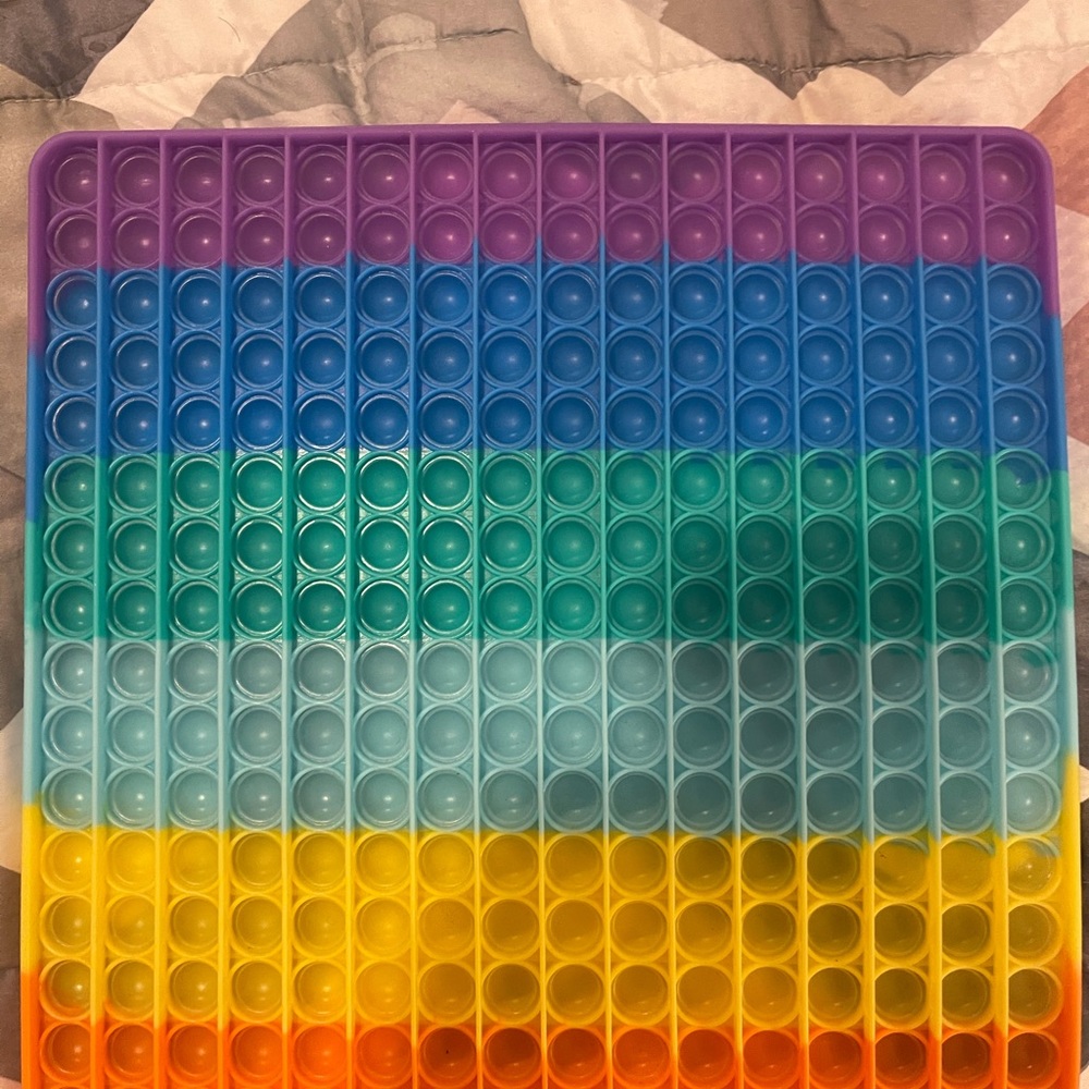 Large rainbow pop it. In great condition.